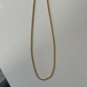 Gold colored necklace